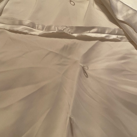 NWOT DAVID’S BRIDAL WEDDING DRESS, Ivory in color says size 12. - Picture 11 of 16